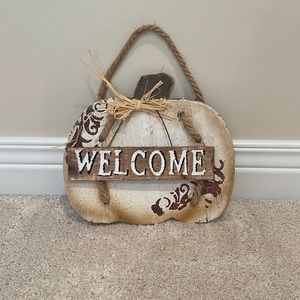 Pumpkin welcome door hanger.